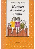 G. Szabó Judit - Hárman a szekrény tetején